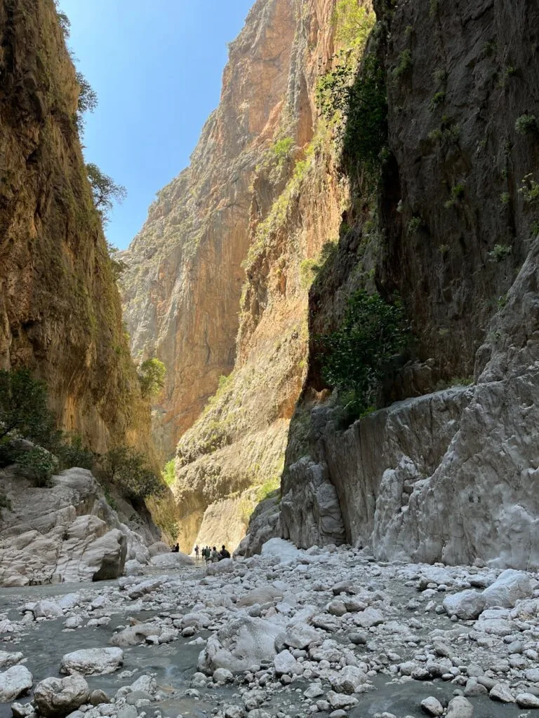 pexels-photo-17603759-17603759 Hikers exploring the stunning Samaria Gorge in Crete, Greece.
